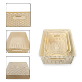Pack of 3 beige woven storage baskets with handles